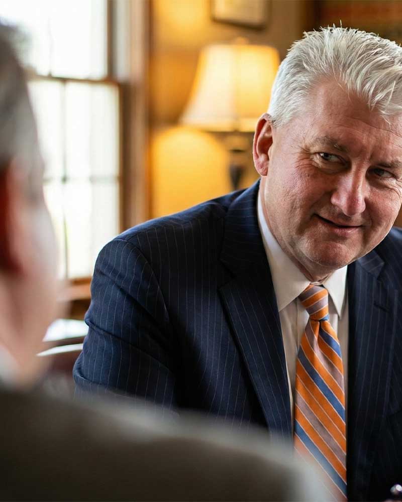 Jim Makowski, Metro Detroit criminal defense and gun law attorney meeting with client
